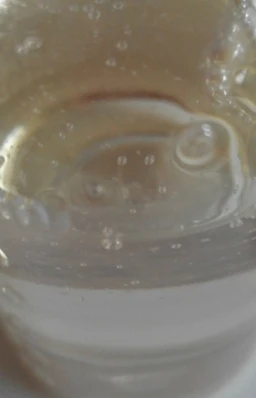 Transparent viscous APG, biodegradable surfactant sample